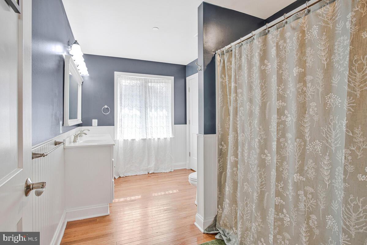1168 Maple Avenue Shady Side, MD 20764 - Photo 20 of 52 Bright and airy bathroom with elegant decor.