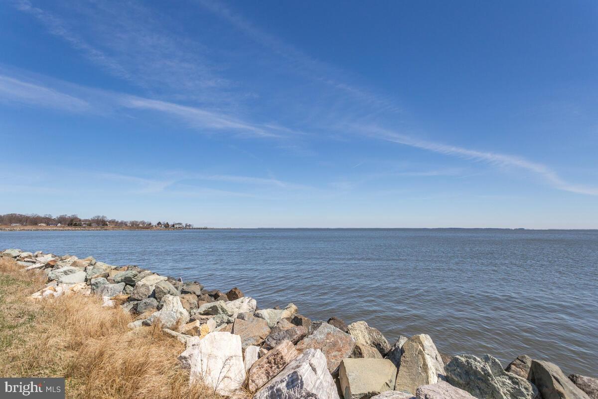 1168 Maple Avenue Shady Side, MD 20764 - Photo 38 of 52 Serene waterfront with rocky shoreline.