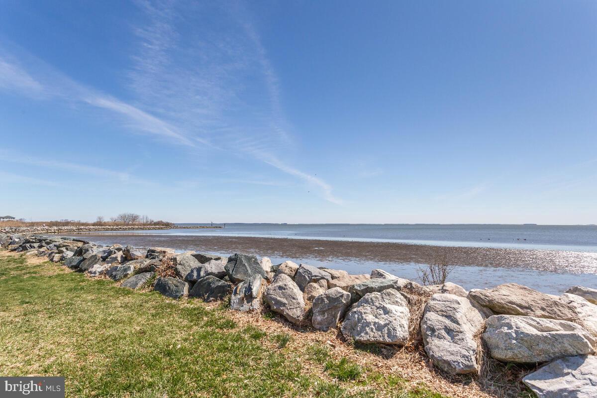 1168 Maple Avenue Shady Side, MD 20764 - Photo 43 of 52 Serene waterfront with rocky shoreline.