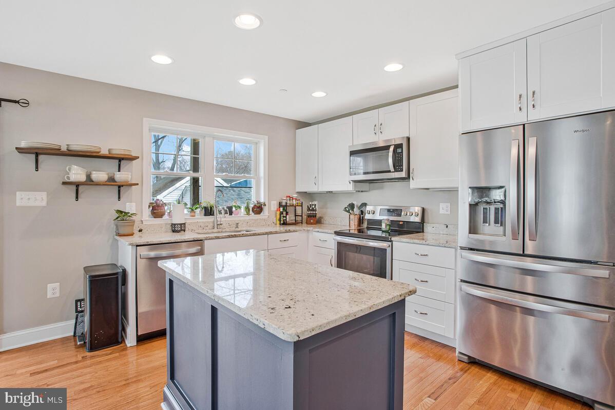 1168 Maple Avenue Shady Side, MD 20764 - Photo 9 of 52 Modern kitchen with sleek finishes.