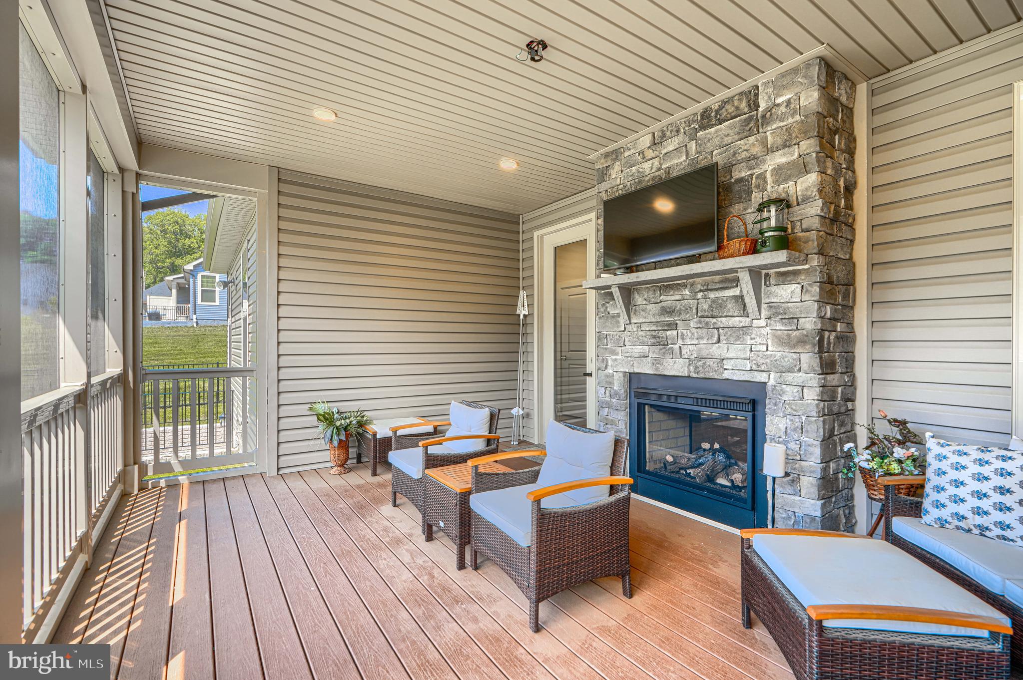 8511 Lallybroch Lane Fulton, MD 20759 - Photo 46 of 78 Outdoor screened porch with Trex