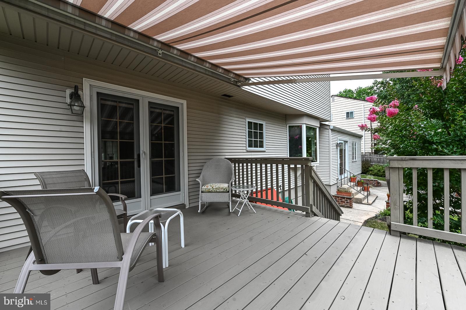 1026 Longspur Road Eagleville, PA 19403 - Photo 13 of 43 deck features an awning
