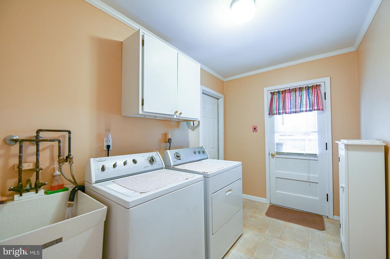 1026 Longspur Road Eagleville, PA 19403 - Photo 23 of 43 main floor laundry with access to garage and yard