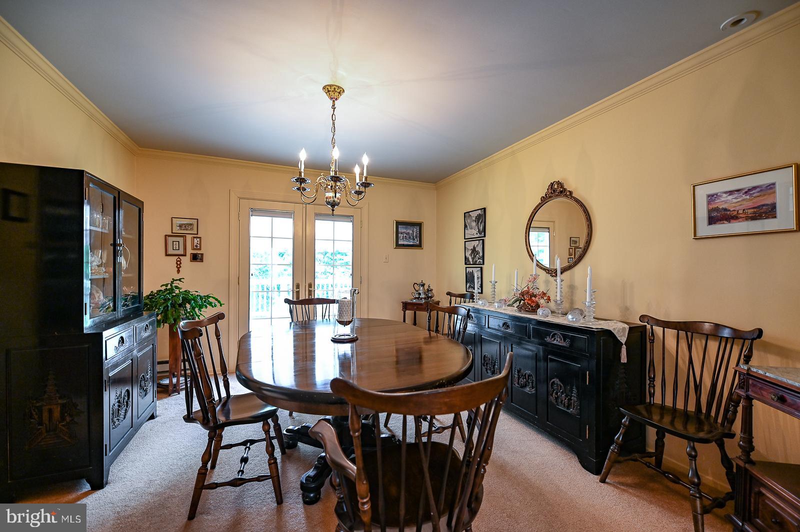 1026 Longspur Road Eagleville, PA 19403 - Photo 27 of 43 dining room has french door access to deck