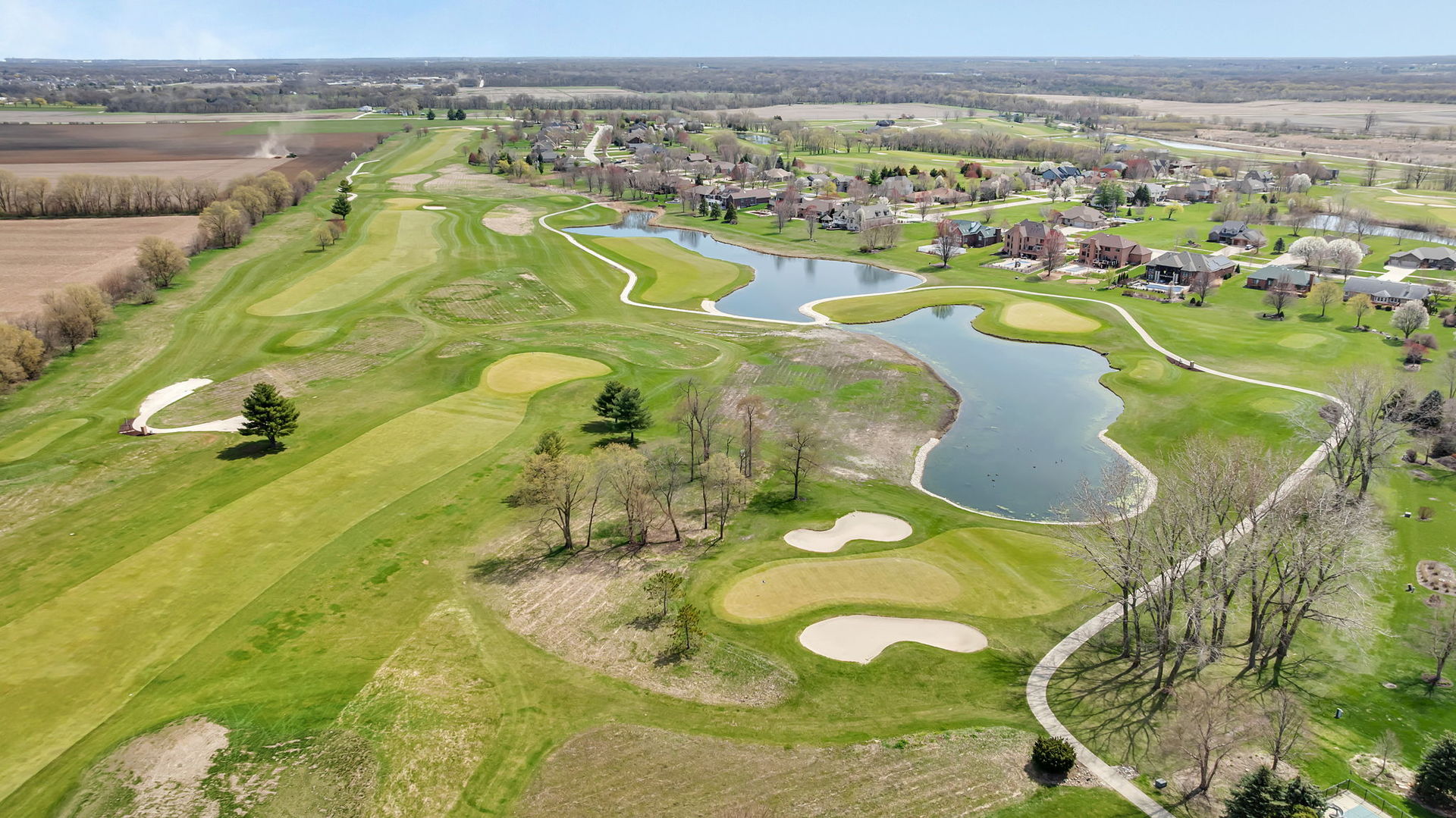 a view of a swimming pool and an outdoor space