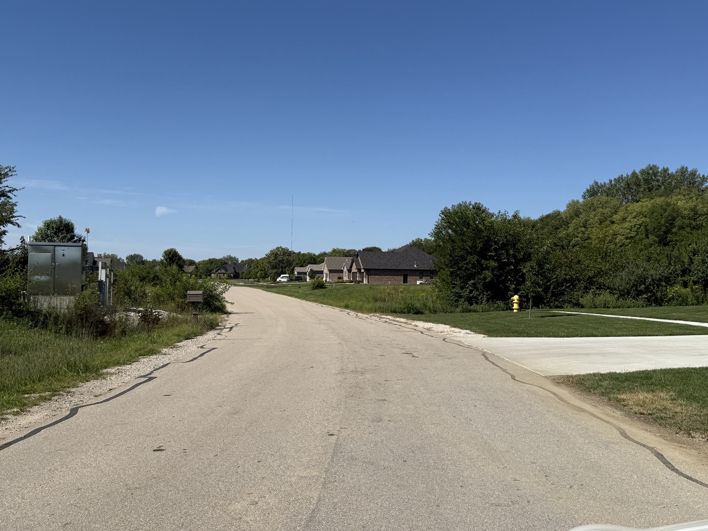 3325 Country Club Lane Morris, IL 60450 - Photo 5 of 8 a view of a lake with houses in the background