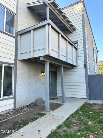 a view of a balcony with an outdoor space