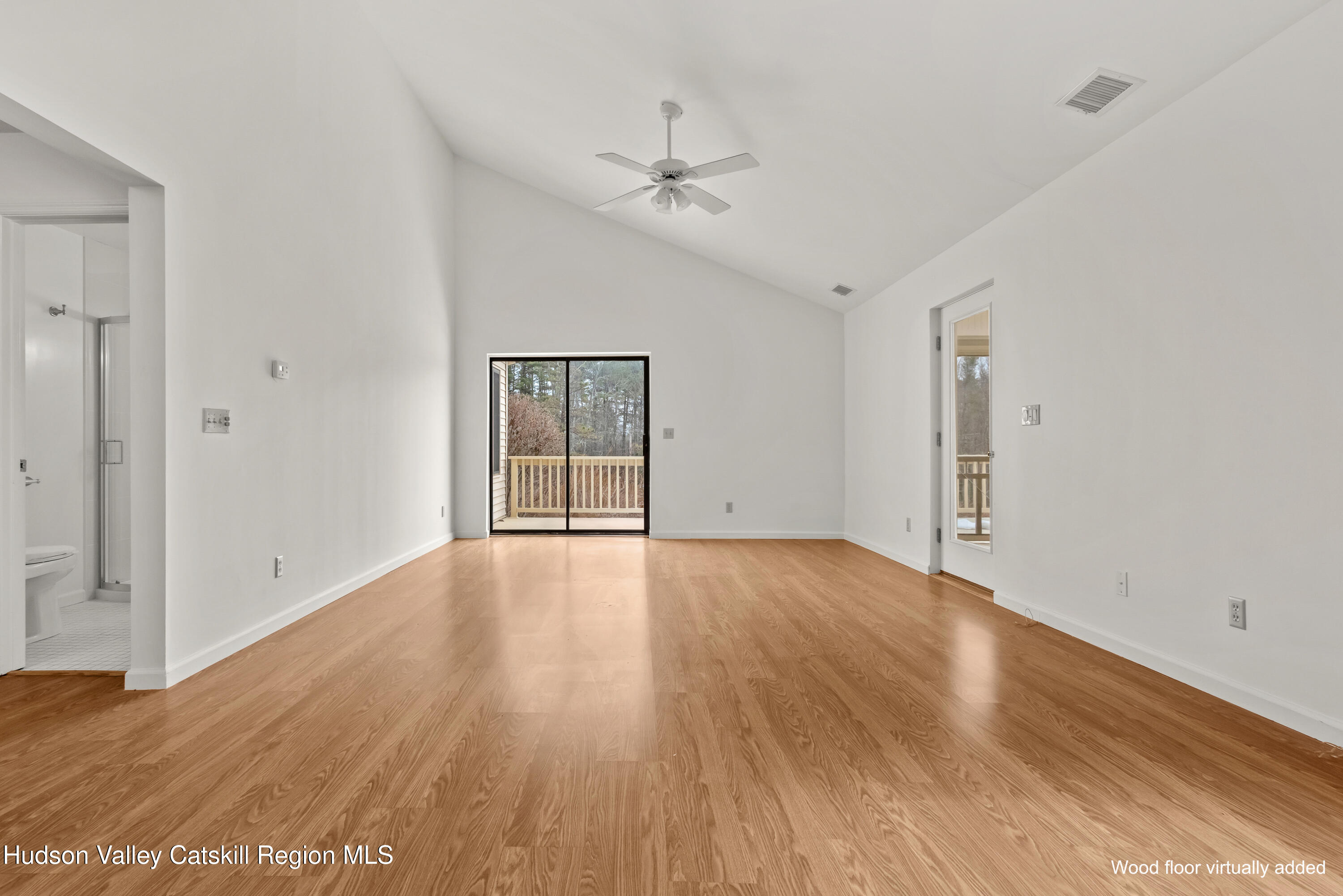 31 Pond Park Road Hurley, NY 12498 - Photo 16 of 39 a view of an empty room with wooden floor and a window
