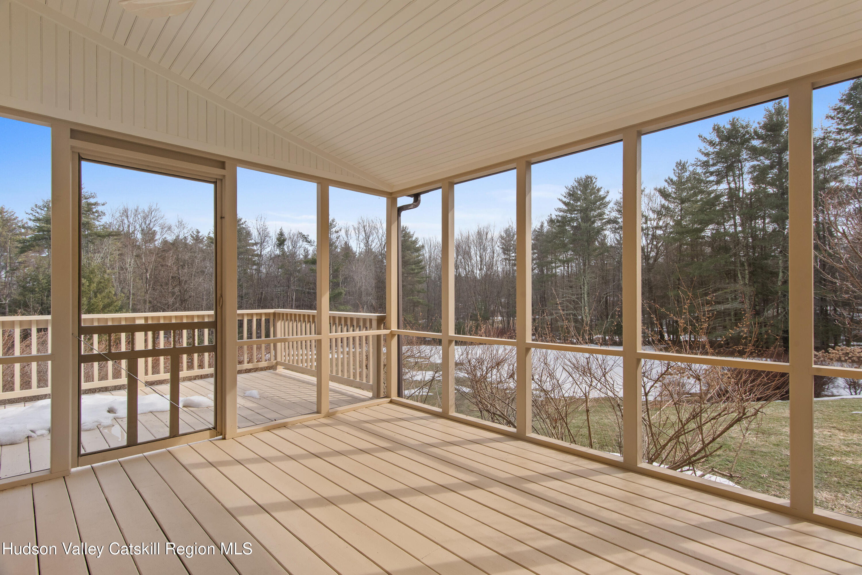 31 Pond Park Road Hurley, NY 12498 - Photo 29 of 39 a view of a balcony with wooden floor and iron stairs