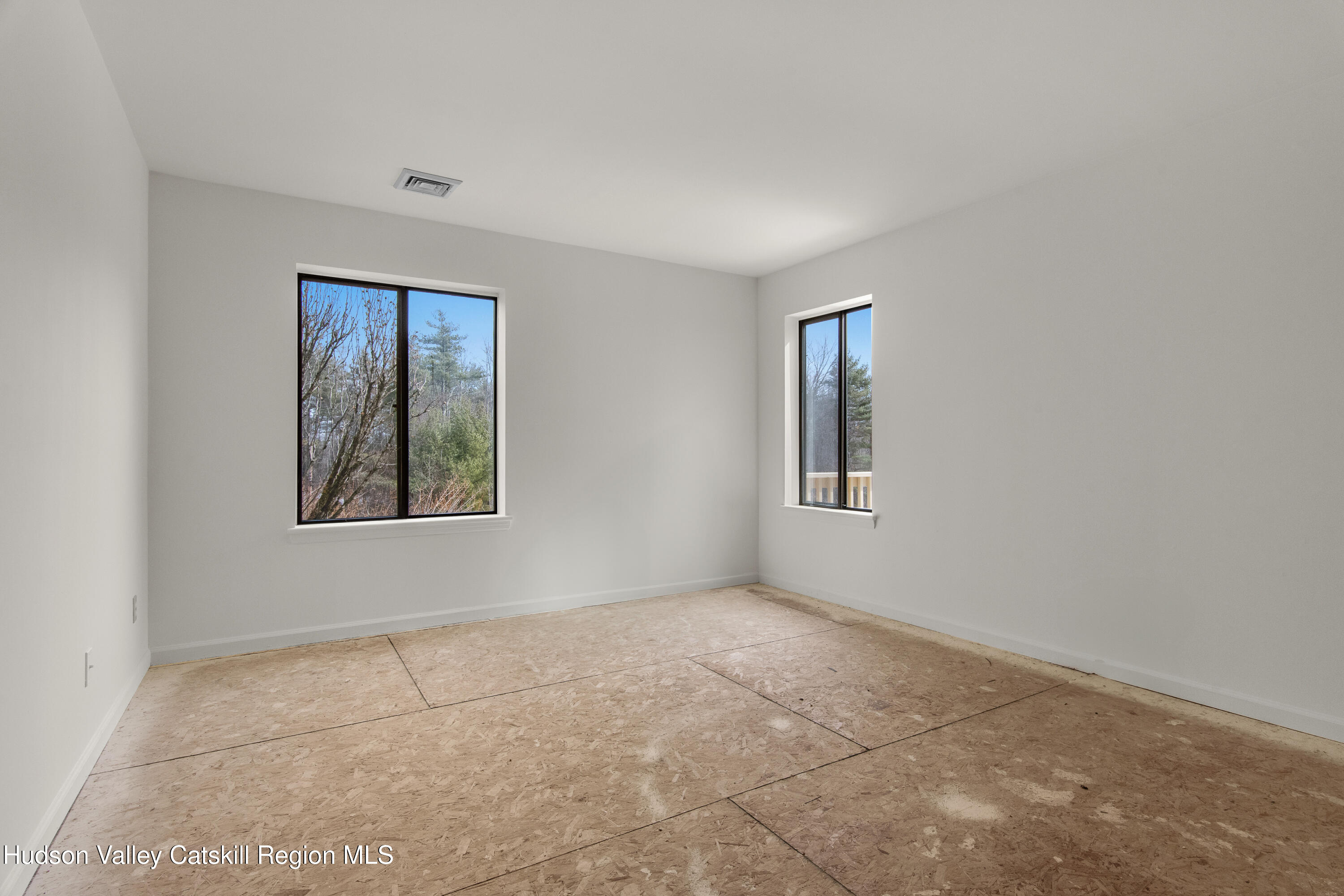31 Pond Park Road Hurley, NY 12498 - Photo 36 of 39 an empty room with windows and closet