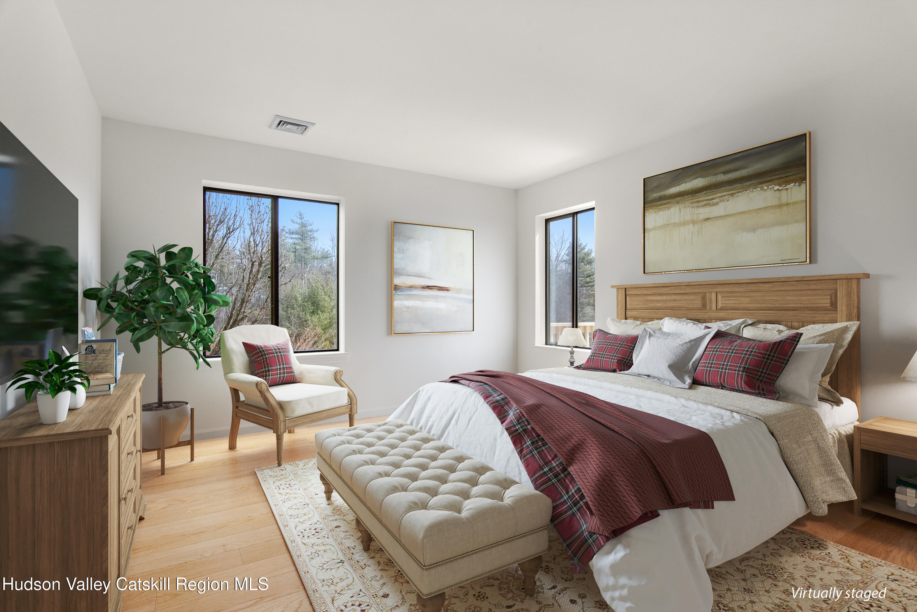 31 Pond Park Road Hurley, NY 12498 - Photo 8 of 39 a bedroom with a bed and a potted plant