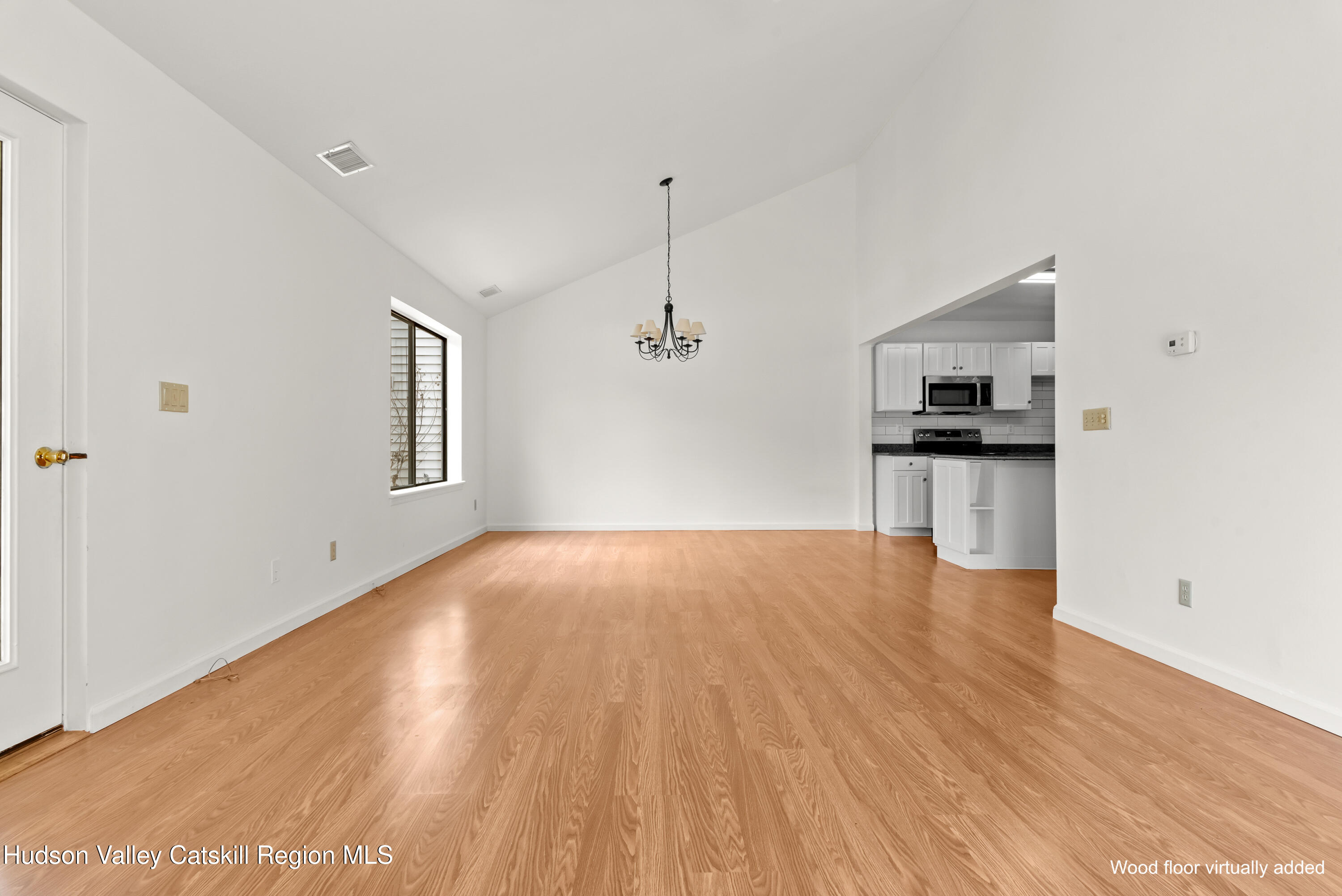 31 Pond Park Road Hurley, NY 12498 - Photo 10 of 39 a view of a kitchen with wooden floor and a sink