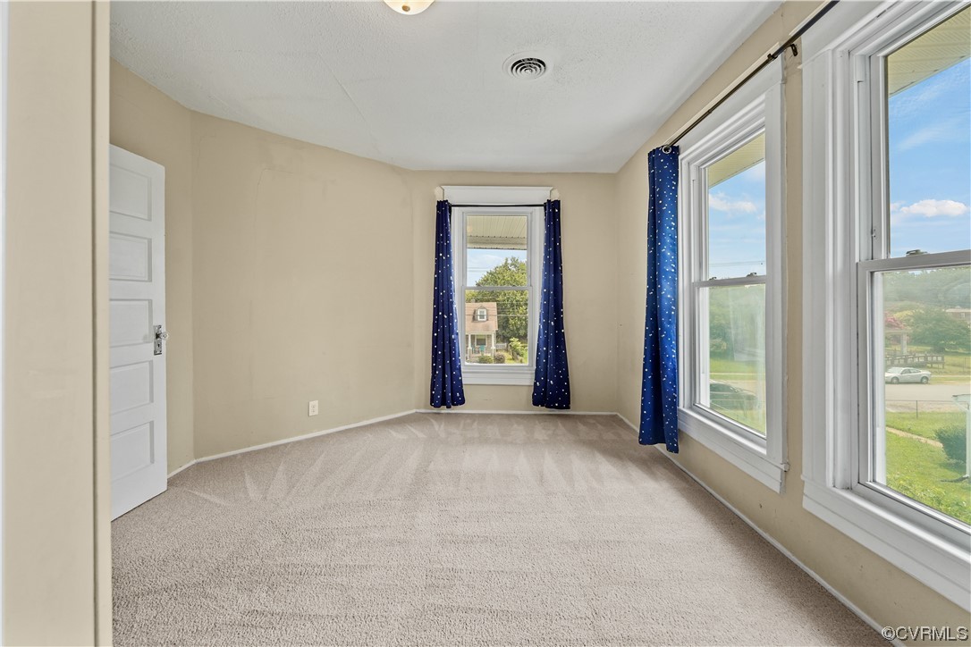 3620 Benton Avenue Richmond, VA 23222 - Photo 17 of 23 an empty room with windows and closet