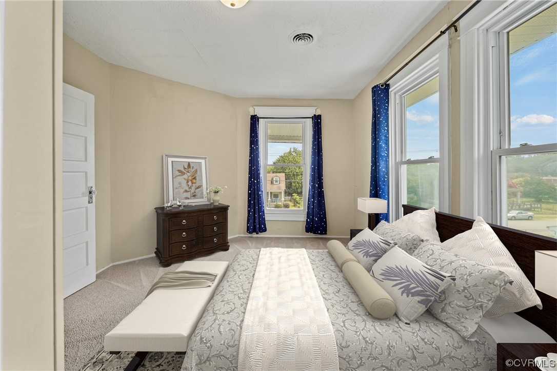 3620 Benton Avenue Richmond, VA 23222 - Photo 18 of 23 a bedroom with a large bed and a window