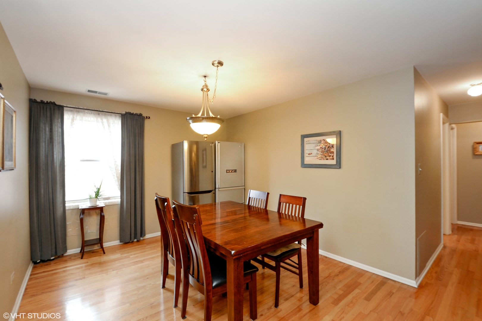 702 South Lytle Street, Unit 2N Chicago, IL 60607 - Photo 19 of 23 a view of a dining room with furniture and wooden floor