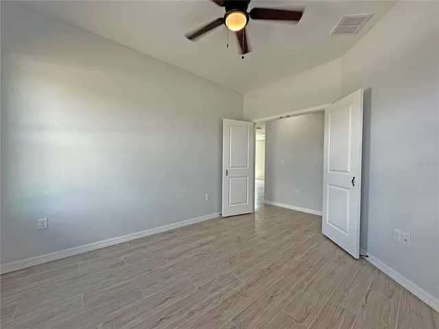 a view of an empty room and window