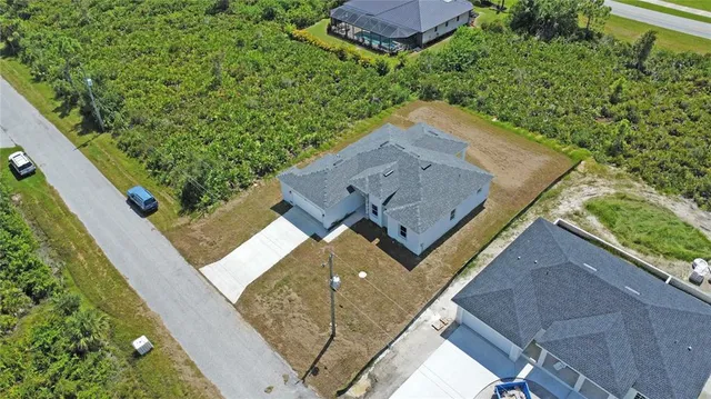 a view of a yard from a balcony