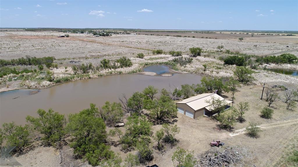 a view of a hallway with white walls