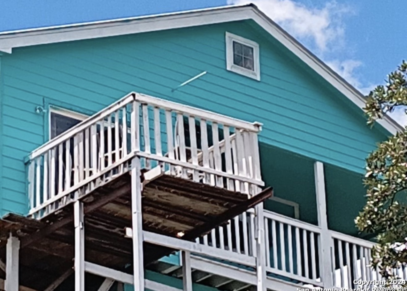 272 Plum Cove Road Lakehills, TX 78063 - Photo 2 of 11 a view of a house with backyard and deck