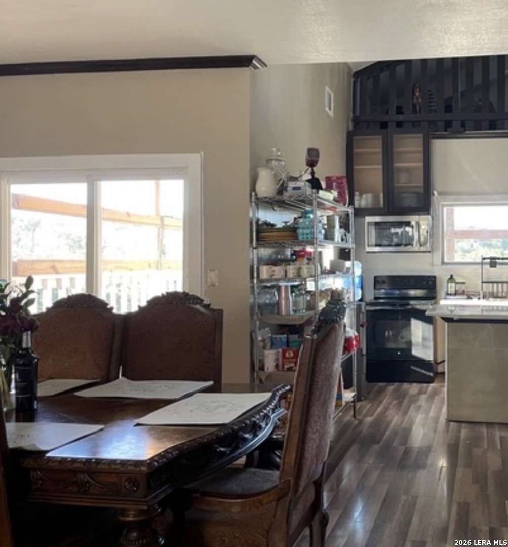 272 Plum Cove Road Lakehills, TX 78063 - Photo 4 of 11 a living room with furniture and a window