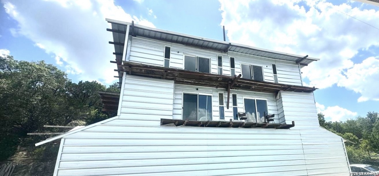 272 Plum Cove Road Lakehills, TX 78063 - Photo 10 of 11 a front view of a house