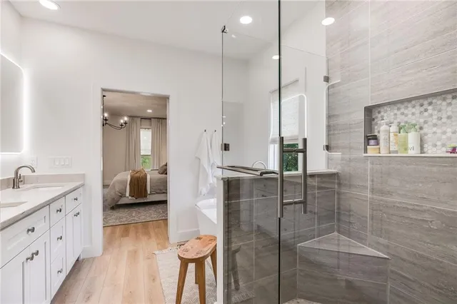 a view of a livingroom with workspace and a couch