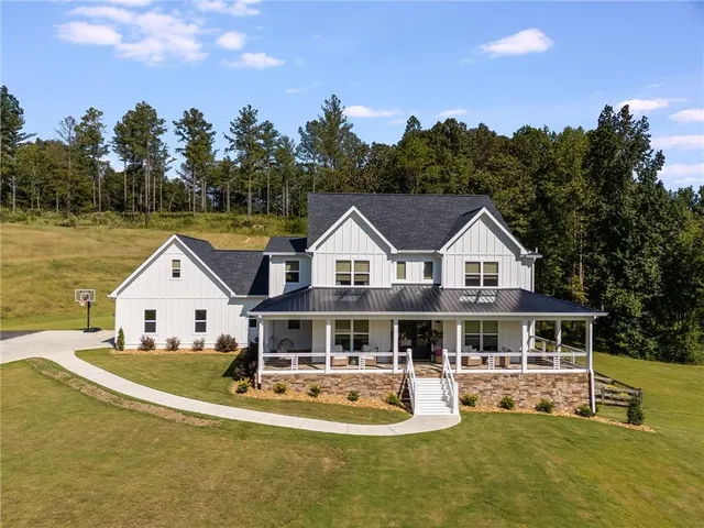 a view of a lake with a yard