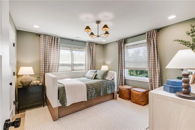 a view of a house with backyard porch and sitting area