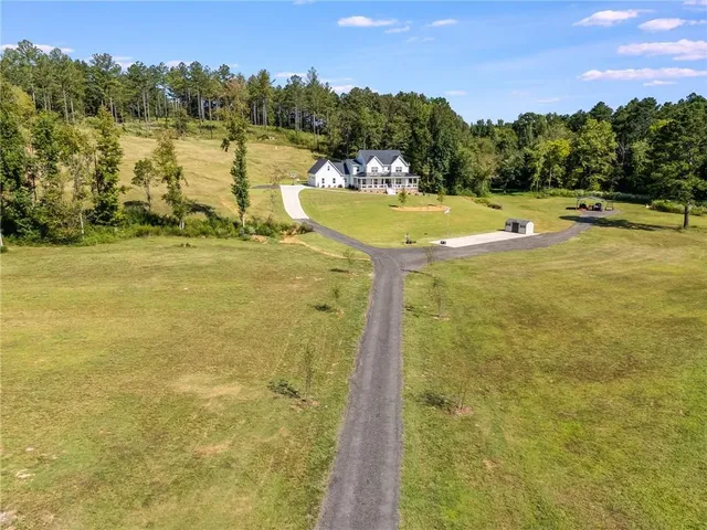 a view of a golf course with a lake