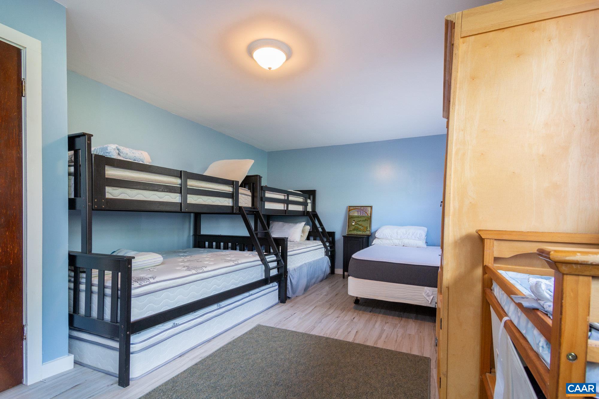 39 Tanglewood Road Palmyra, VA 22963 - Photo 24 of 33 a bedroom with furniture and a window
