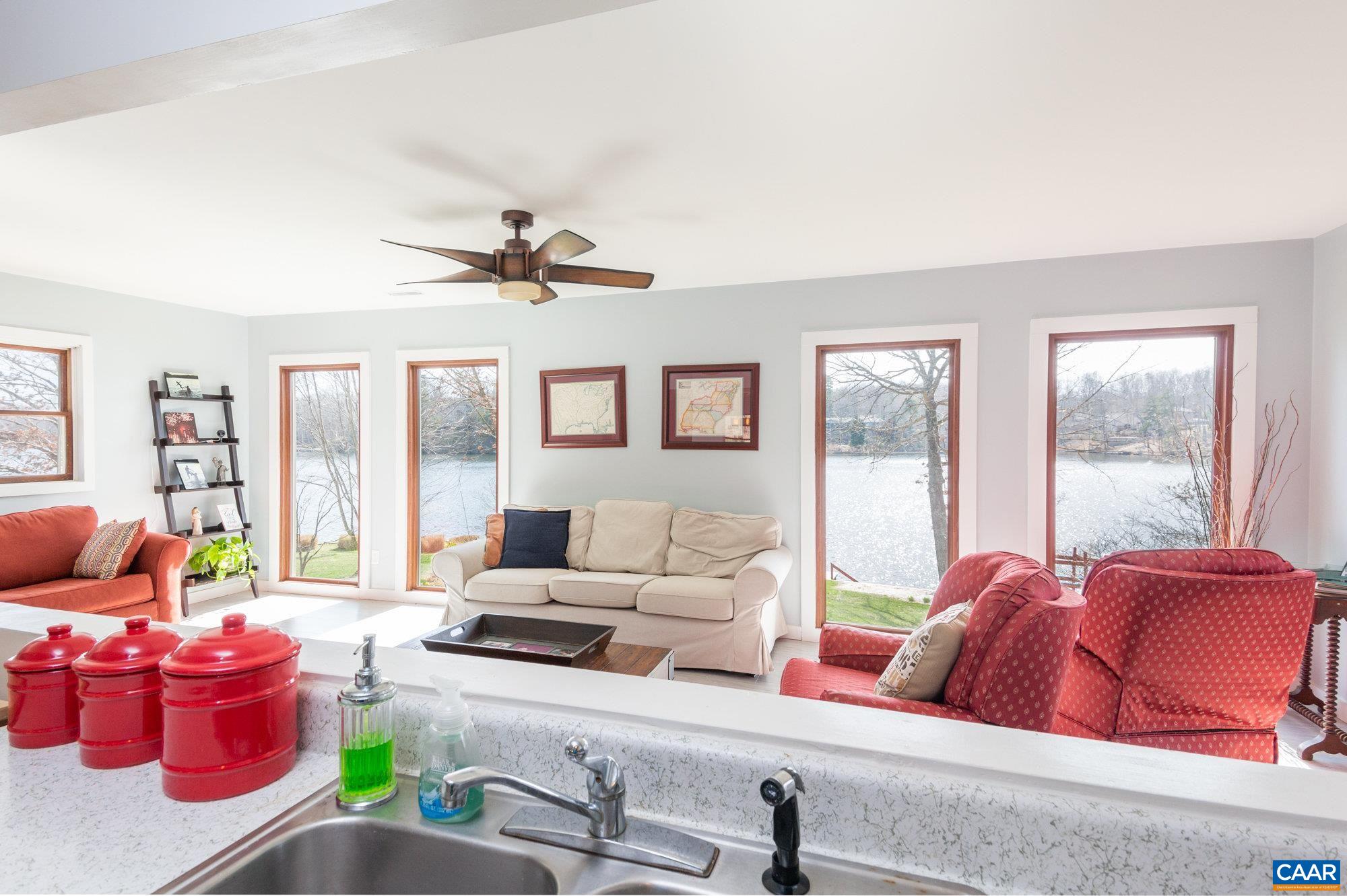 39 Tanglewood Road Palmyra, VA 22963 - Photo 6 of 33 a living room with furniture and a large window