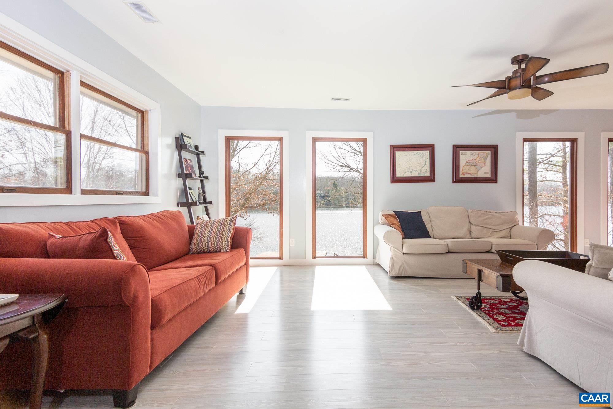 39 Tanglewood Road Palmyra, VA 22963 - Photo 7 of 33 a living room with furniture and a large window