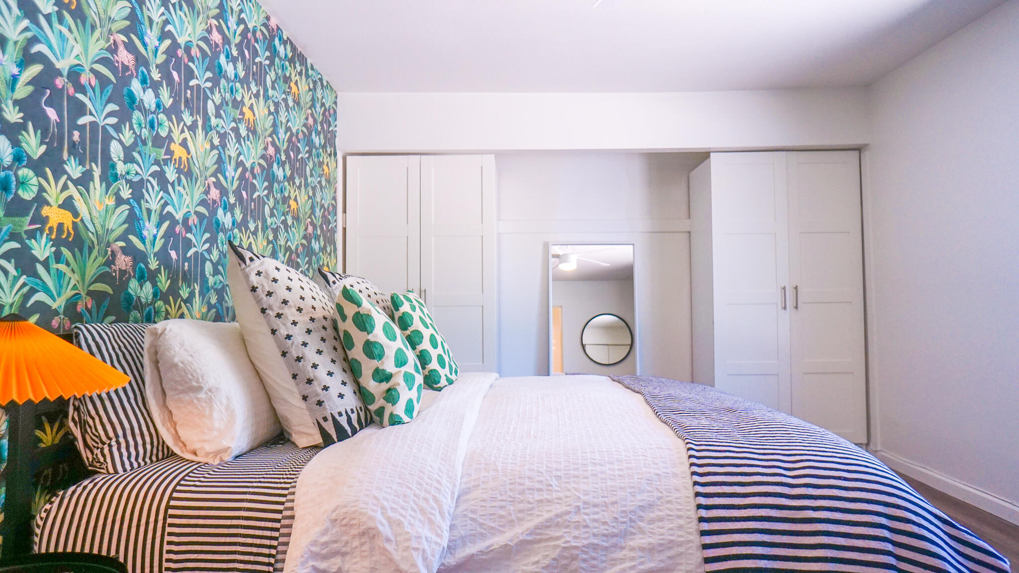 70355 Cobb Road Rancho Mirage, CA 92270 - Photo 13 of 27 a bedroom with a bed and a painting on the wall