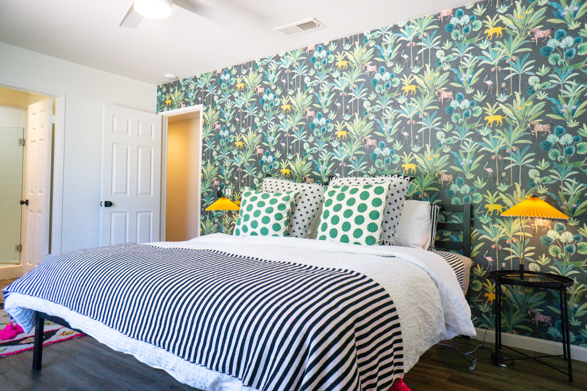 70355 Cobb Road Rancho Mirage, CA 92270 - Photo 14 of 27 a bedroom with a bed and a chandelier