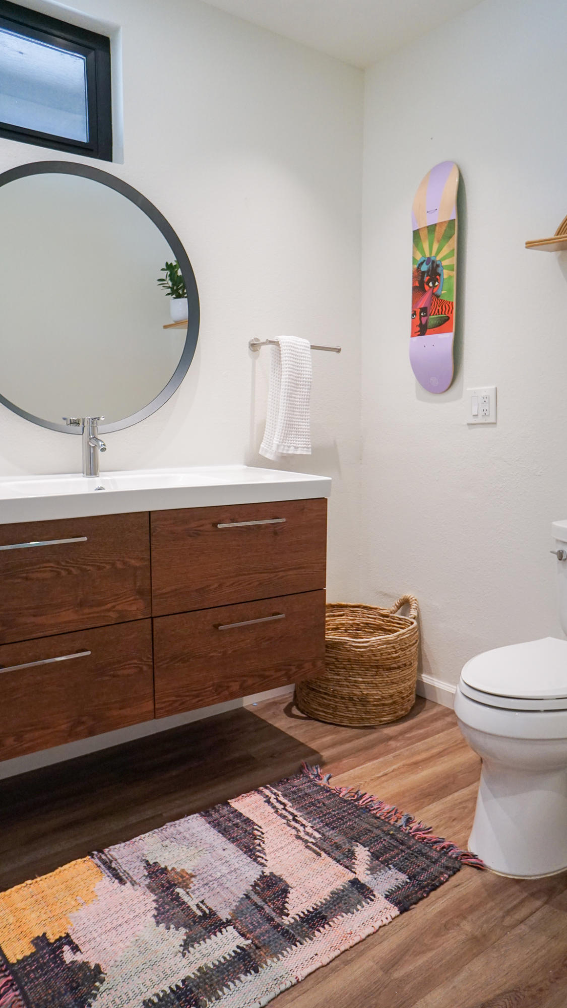 70355 Cobb Road Rancho Mirage, CA 92270 - Photo 16 of 27 a bathroom with a toilet a sink and mirror