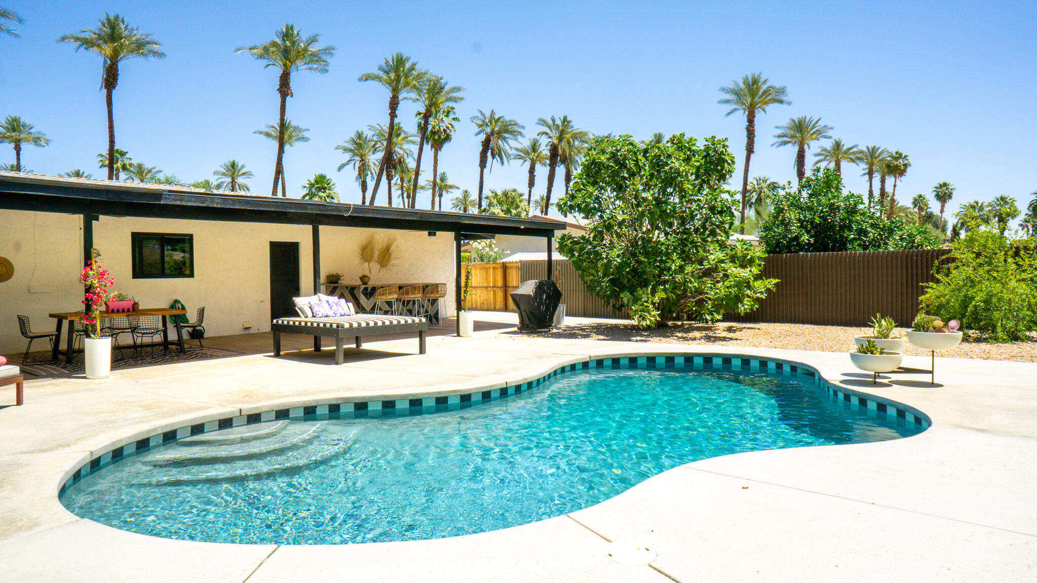 70355 Cobb Road Rancho Mirage, CA 92270 - Photo 24 of 27 a view of a swimming pool with a patio