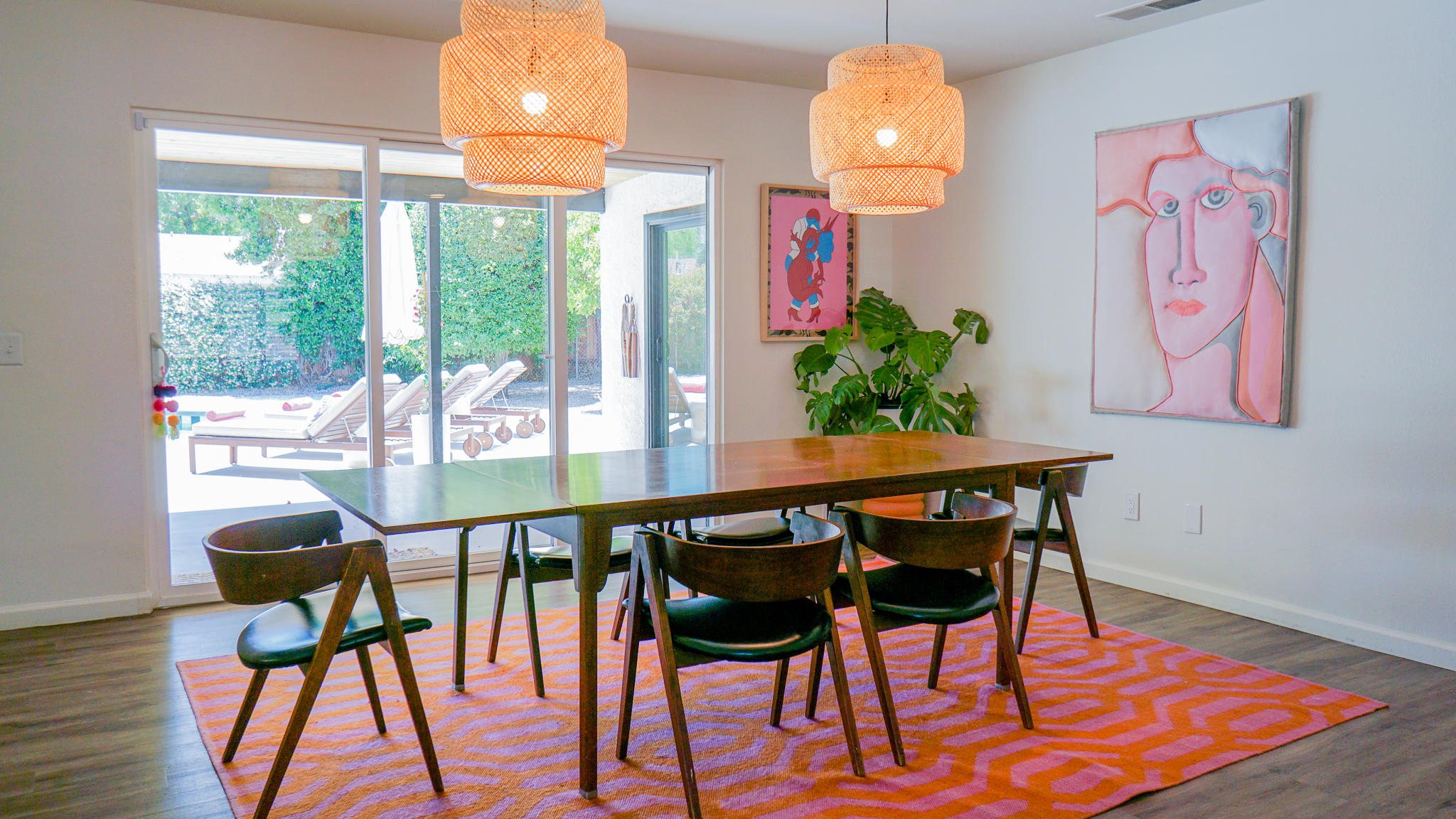 70355 Cobb Road Rancho Mirage, CA 92270 - Photo 7 of 27 a view of a dining room with furniture a chandelier and wooden floor