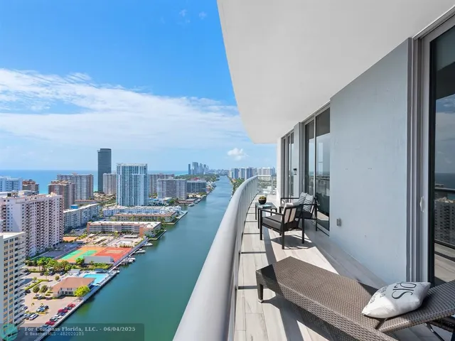 a view of balcony with furniture