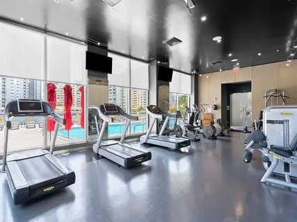 a view of a room with gym equipment