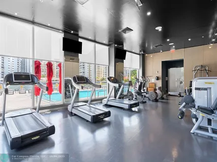 a view of a room with gym equipment