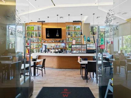 a outdoor dining space with furniture window and wooden floor