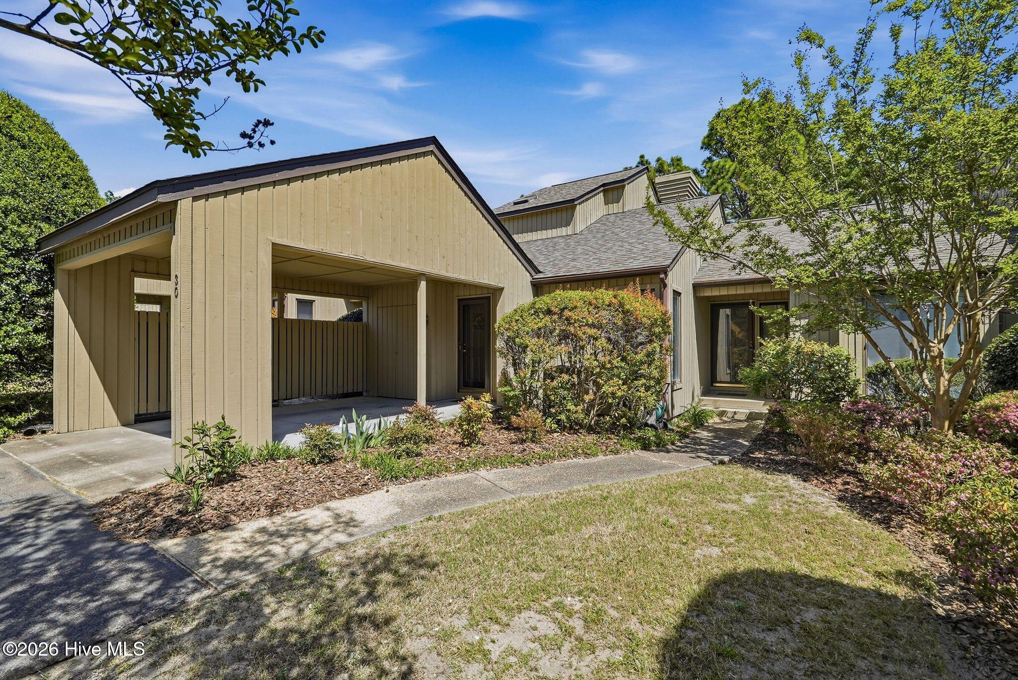 30 Lake Pinehurst Villas Road Pinehurst, NC 28374 - Photo 40 of 40 Carport/Front lawn