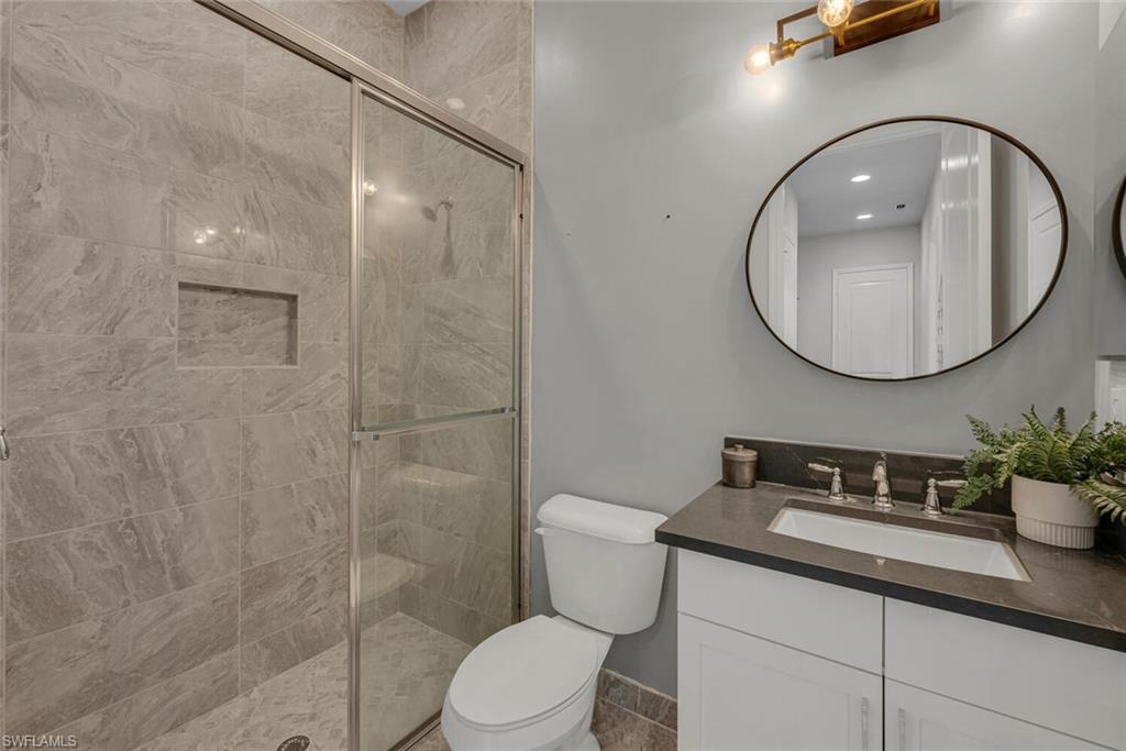 4541 Azalea Drive Naples, FL 34119 - Photo 15 of 35 Bathroom 1 (downstairs)