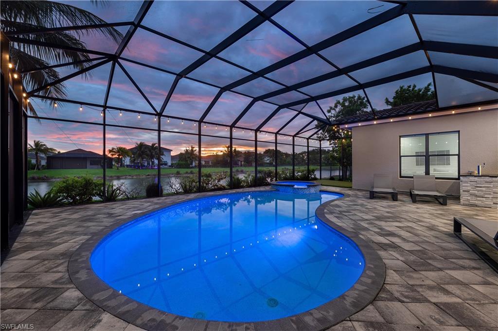 4541 Azalea Drive Naples, FL 34119 - Photo 32 of 35 Pool area at dusk