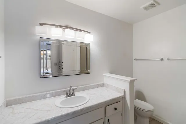 a view of a livingroom with natural light
