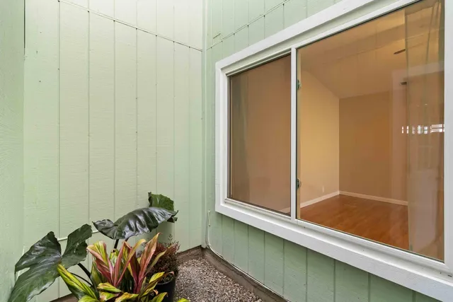 a house with a tree in front of it