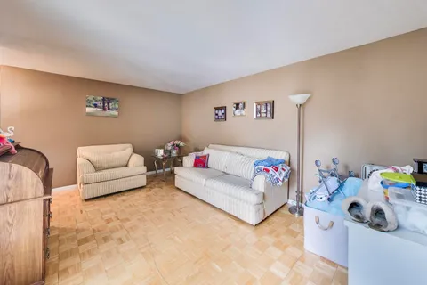 a living room with furniture and a couch
