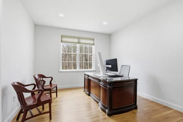 a room with furniture and a window