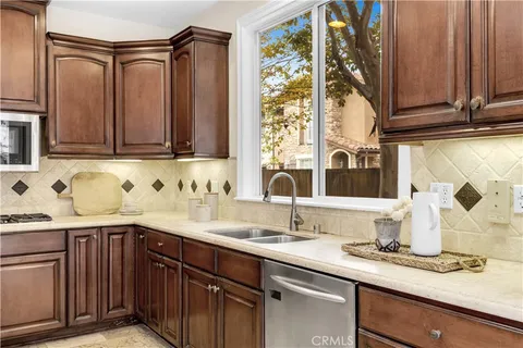a kitchen with a sink and a cabinets