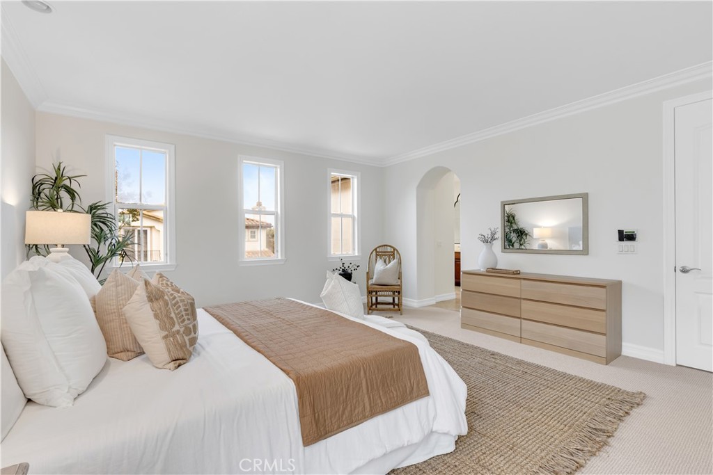 2105 Canyon Circle Costa Mesa, CA 92627 - Photo 21 of 35 a bedroom with a bed and a mirror